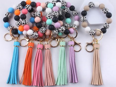 Wholesale Leather Tassel Silicone Beads Wooden Beads Bracelet Keychain For Sale