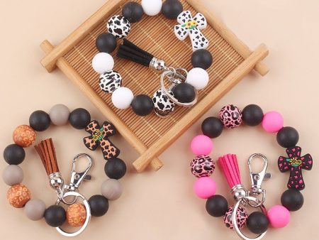 Wholesale Silicone Leather Wooden Beads Tassel Print Leopard Bracelet Keychain Cheap